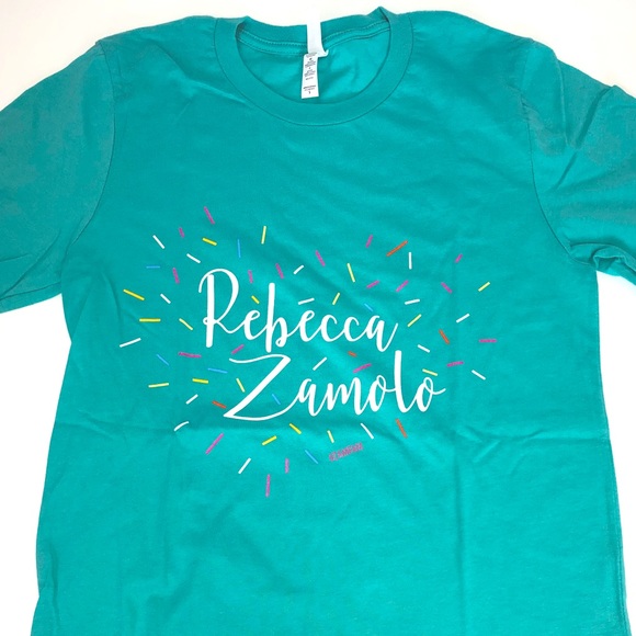 Rebecca Zamolo Merch Lip Gloss - Rwanda 24